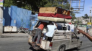 Residents of Haitian capital improvise for their shelter