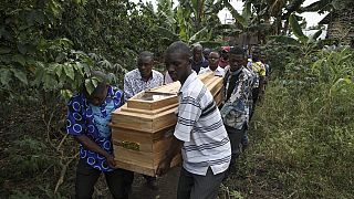 Uganda: Grieving relatives bury their dead after school attack