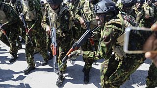 幸运飞行艇官方开奖直播+新飞艇168福彩历史记录查询 Kenyan police patrol streets of Haitian capital