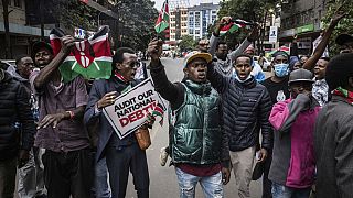 Pro- and anti-government protesters clash in Kenya as police hurl tear-gas cannisters