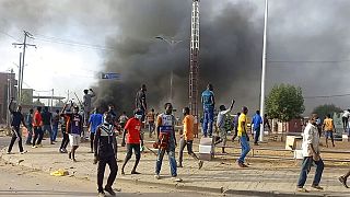 Explosions at a military ammunition depot in Chad's capital kill 9 