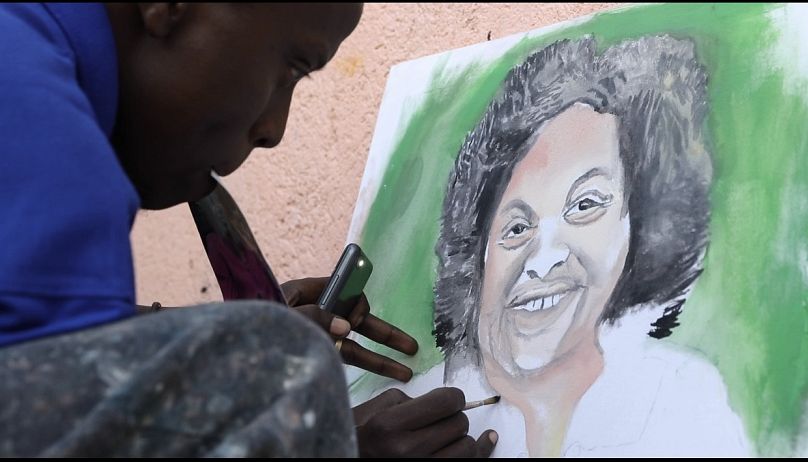 Jean de Dieu Uwukunda, a visually impaired artist from Rwanda, has built a successful career in painting and drawing despite his blindness. 